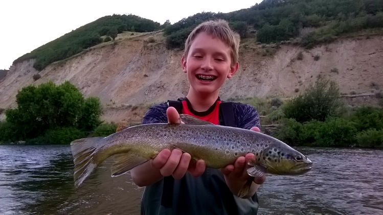 My son's friend with his first nice brown on fly.  Nothing better then taking a kid who's never been.