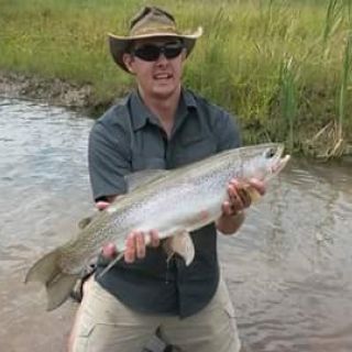 A happy client with his first trout ever! 