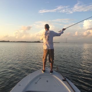 Casting to a pod of tarpon that we could see pushing a wake at first light.  