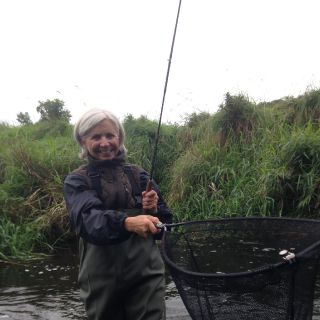 Malory, USA first time fly fishing with her first Irish brown trout