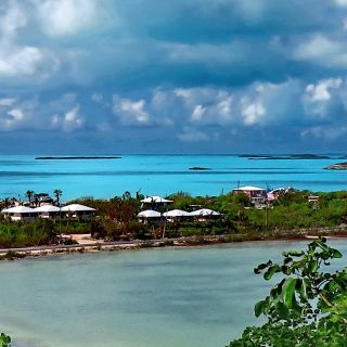 Fisherman enjoying some bonefishing right beside the villas at Harbour Club.