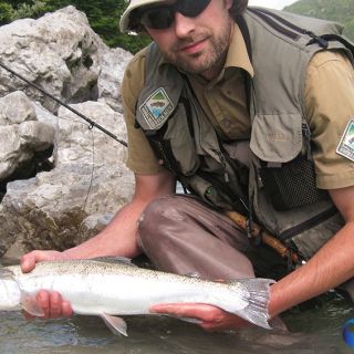 My friend Aleš with his well sized #rainbowtrout 