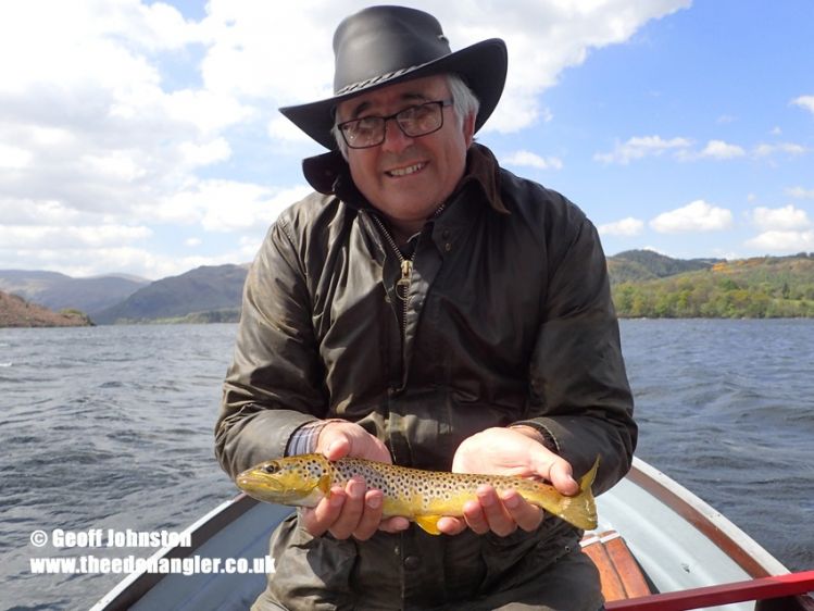Colin with a nice fish on his first day of fly fishing on our lakes