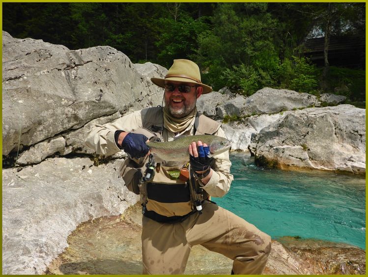 Emerald river and the Alps - where else would you prefer to land your trout!?